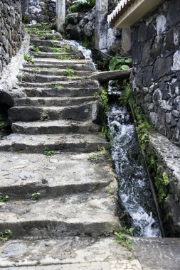 levada near old stairs from stone clipart
