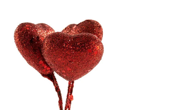 Tři červené dekorace srdce — Stock fotografie