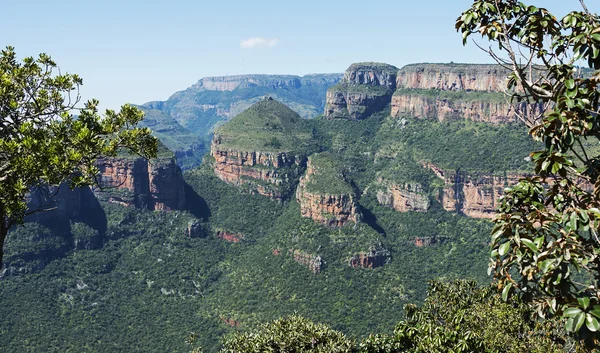 De tre rondavels i Afrika - Stock-foto