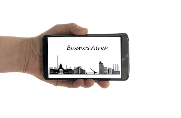 Жіночий руку з мобільного телефону горизонтом Буенос-Айрес — стокове фото