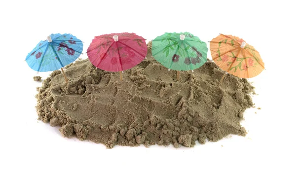 Cocktail Umbrella in Sand Mound — Stock Photo, Image