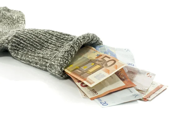 Putting money in sock — Stock Photo, Image