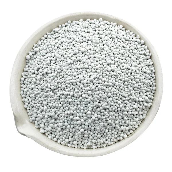 Minerale meststoffen in een chemische porseleinen kopje — Stockfoto