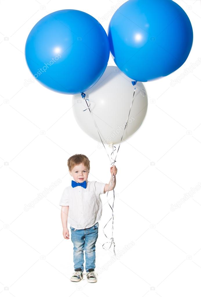 Huis buitenaards wezen Ga naar het circuit Little boy holding a bunch of colored large balloons Stock Photo by  ©kirill_grekov 103545466