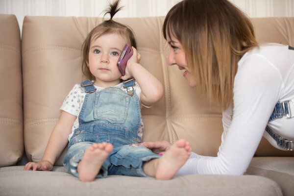 Mother and her little daughter