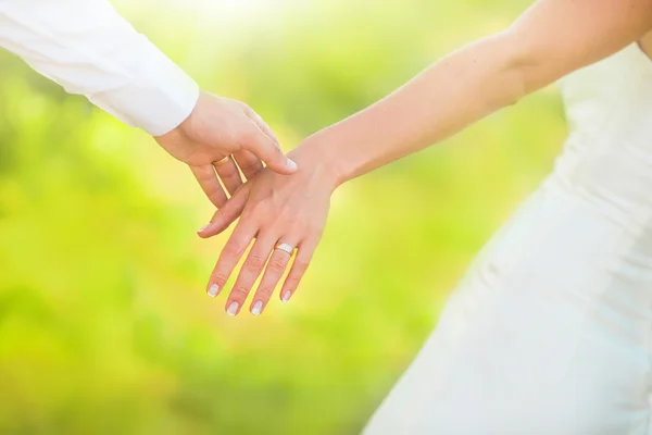 Hand of married people