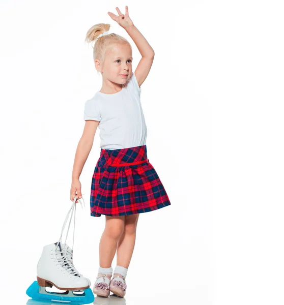 Kleines Mädchen mit Schlittschuhen — Stockfoto