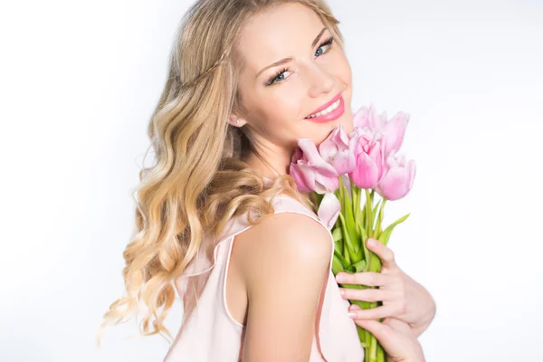 Donna con bouquet di tulipani — Foto Stock