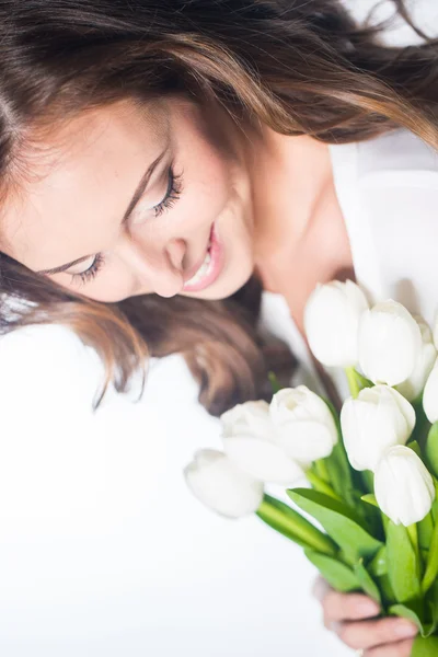 Woman with tulip flowers — Stock Photo, Image