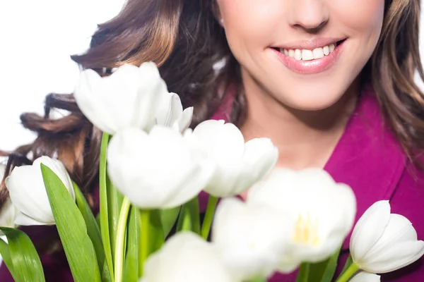 Kobieta z kwiatów tulipanów — Zdjęcie stockowe