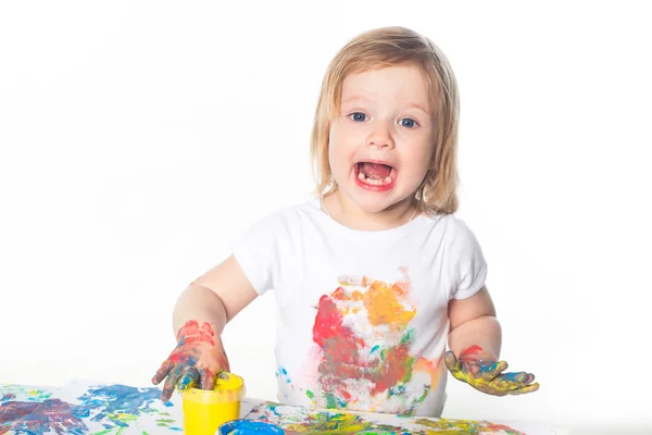 Meisje spelen met vinger verven — Stockfoto