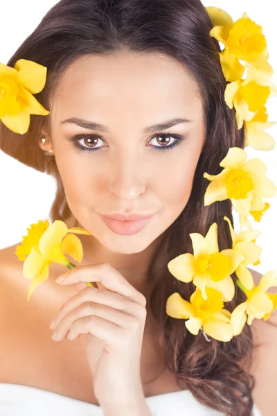 Woman with narcis flowers in hair Royalty Free Stock Photos