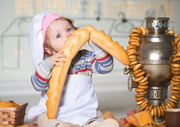 Little boy in bakery — Stock Photo, Image