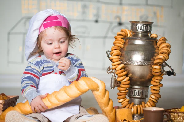 Little boy in bakery — Stock Photo, Image