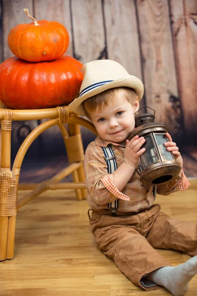 Little boy with pumpkin — Stock Photo, Image