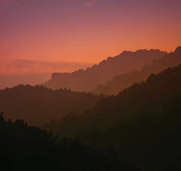 Montanhas no por do sol — Fotografia de Stock