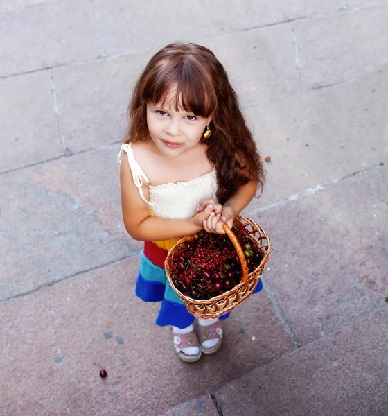 Beautiful girl with basket — Stock Photo, Image