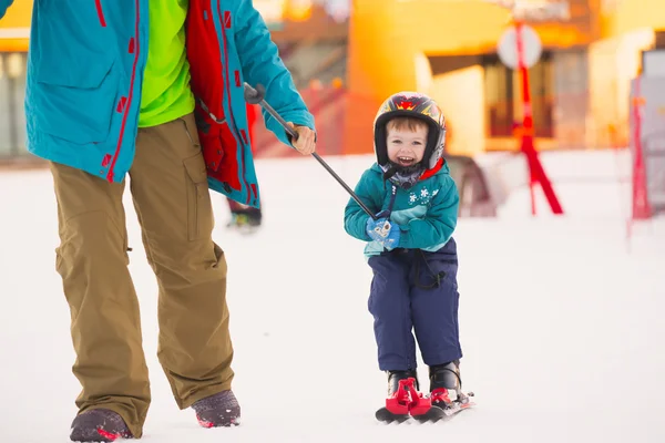 Father with son skiing in the mountains — Stock Photo, Image