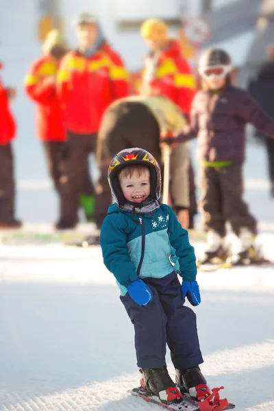 Toddler boy skiing in the mountains — Stock Photo, Image