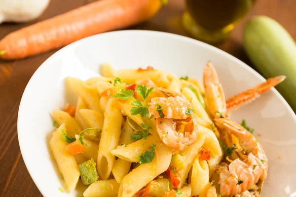 Penne with lobsters, bottarga and zucchini — Stock Photo, Image