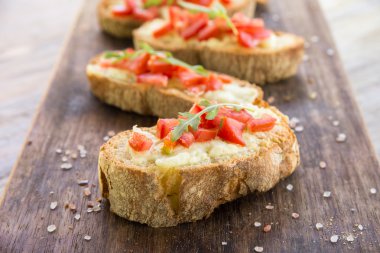 Italian bruschette with tomato and cheese clipart