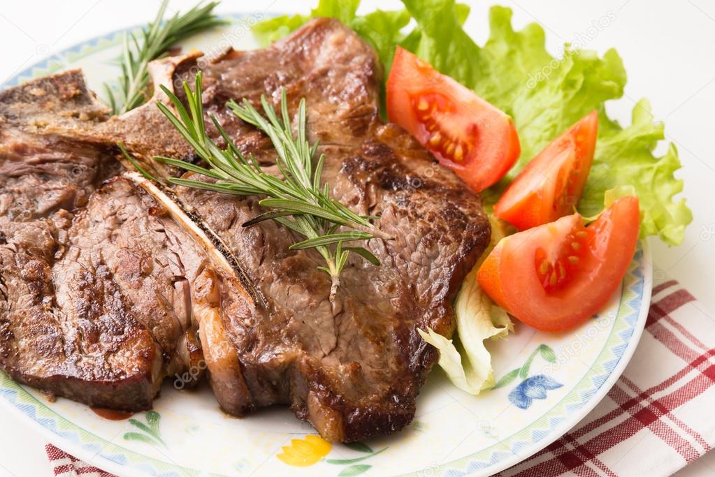 Roasted beef steak with vegetable salad 