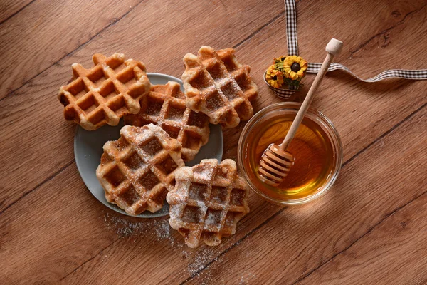 Waffle with honey — Stock Photo, Image