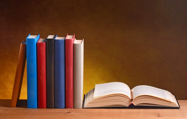 Books on the wooden table — Stock Photo, Image