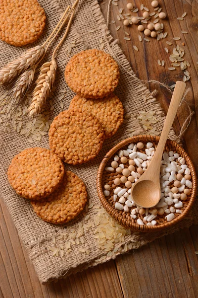 Biscuits on cereals and rice — Stock Photo, Image