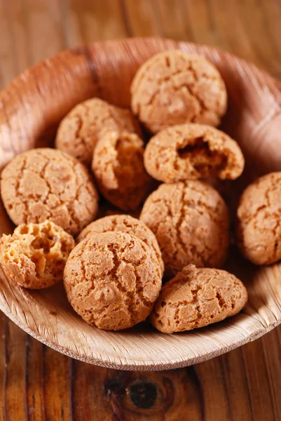 Amaretti in the wooden bowl — Stock Photo, Image