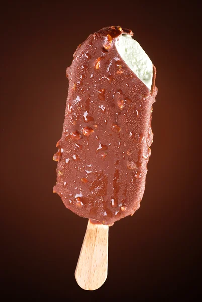Ice cream covered with chocolate — Stock Photo, Image