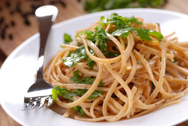 Pasta with arugula — Stock Photo, Image