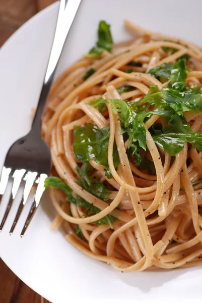 Pasta with arugula — Stock Photo, Image