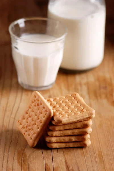 Pile of cookies on the wooden table — Stock Photo, Image