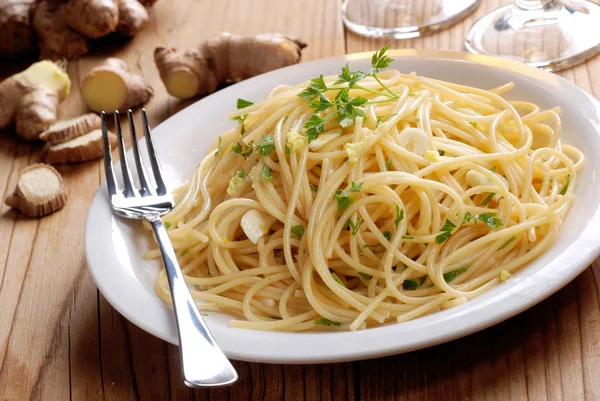 Spaghetti with ginger and parsley — Stock Photo, Image