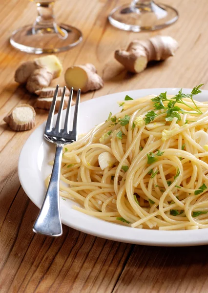 Spaghetti with ginger and parsley — Stock Photo, Image