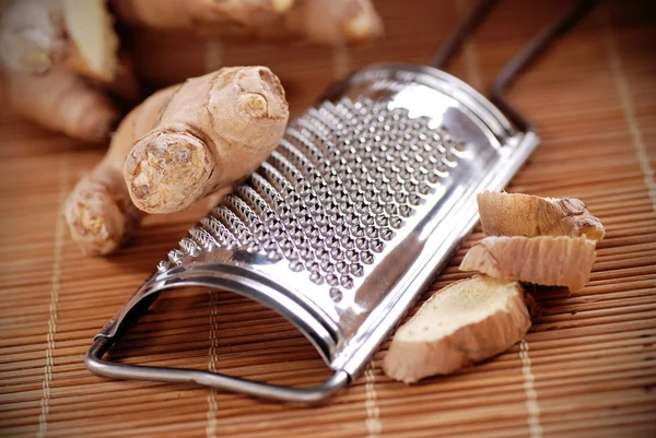 Ginger and grated — Stock Photo, Image