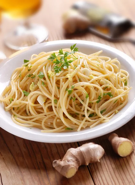 Spaghetti with ginger and parsley — Stock Photo, Image