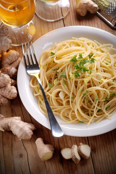 Spaghetti with ginger and parsley — Stock Photo, Image