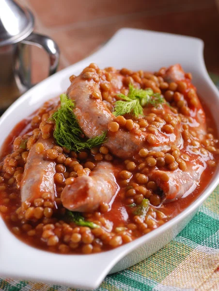 Sausage and lentils — Stock Photo, Image