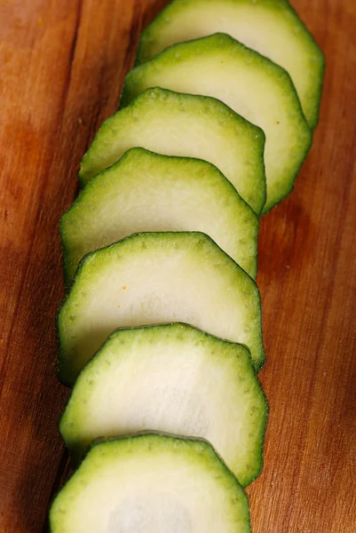 Zucchini sliced on cutting board — Stock Photo, Image