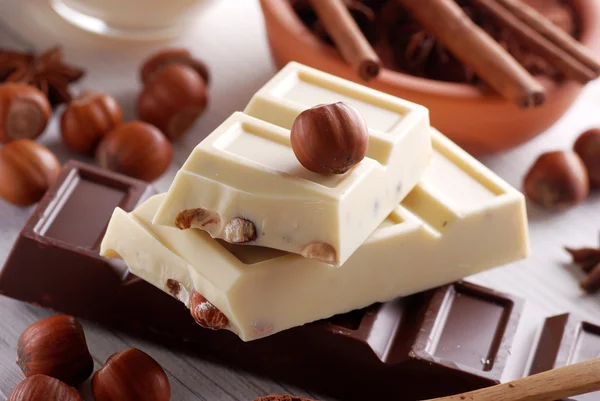 Chocolate and hazelnuts — Stock Photo, Image