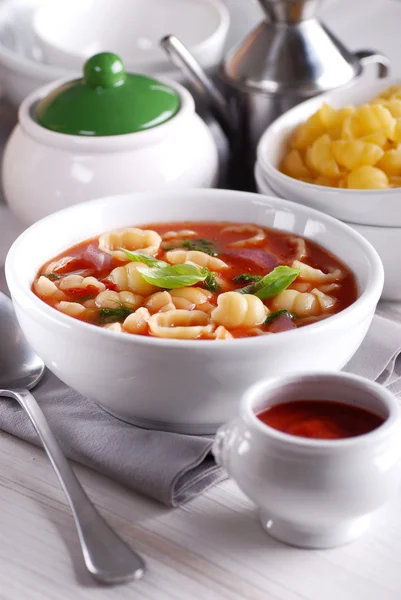 Soup with pasta and tomato — Stock Photo, Image