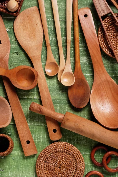 Kitchenware on wooden table — Stock Photo, Image