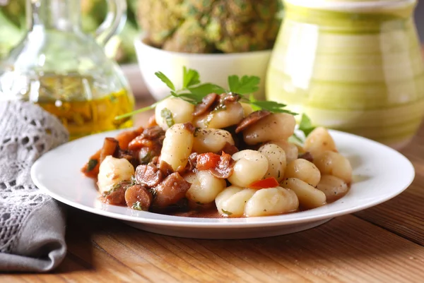 Potato gnocchi with mushrooms — Stock Photo, Image