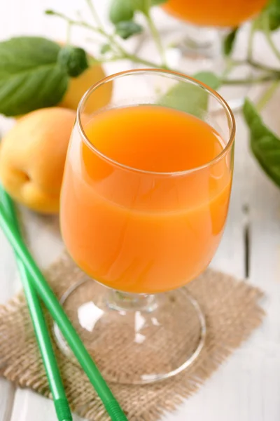 Apricot juice in the glass — Stock Photo, Image