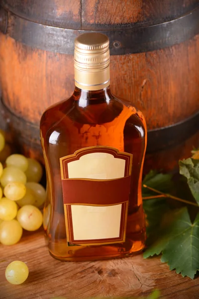 Liqueur in the glass bottle — Stock Photo, Image