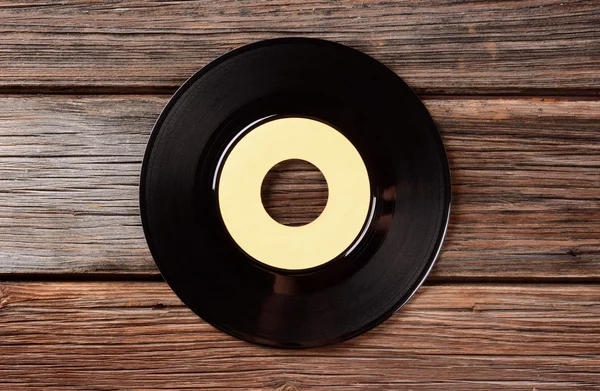 Disco de vinil na mesa — Fotografia de Stock