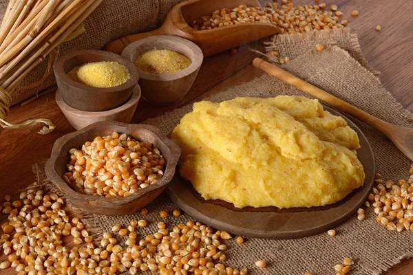 Hot polenta in cutting board — Stock Photo, Image