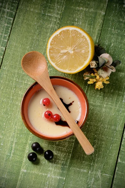 Lemon dessert decorated with currants — Stock Photo, Image